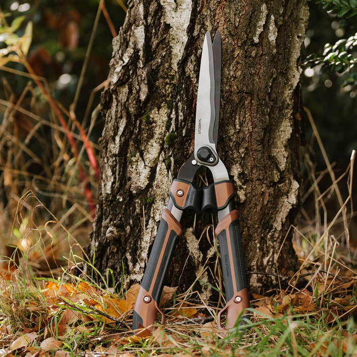 Kent & Stowe Garden Life Box Shears resting on tree trunk
