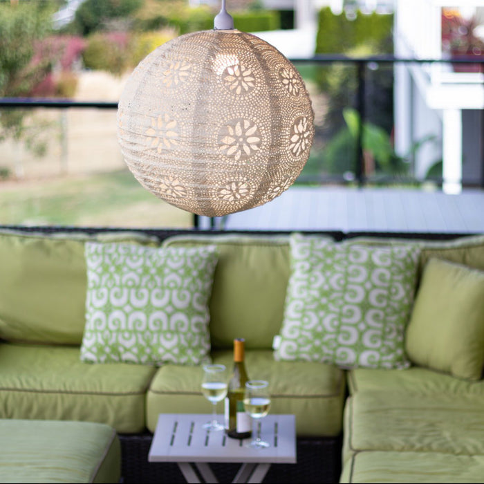 Soji Stella Nova Indoor Outdoor Tyvek Pendant Lamp outdoors on deck
