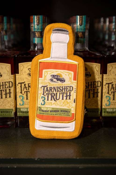 Tarnished Truth Bottle Dog Toy