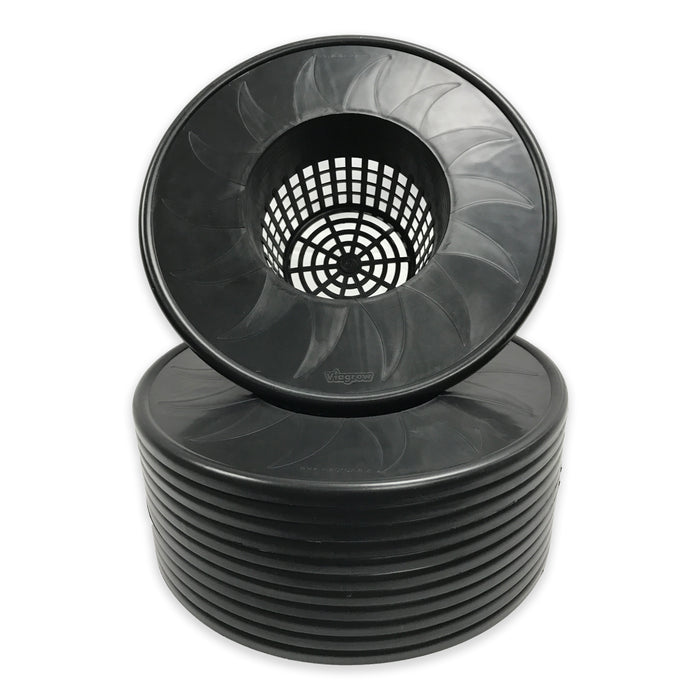 A stack of black mesh pot bucket lid inserts, with the top one showing the net-like structure through which air can pass.