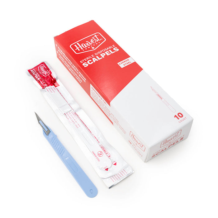 Harvest brand sterile disposable scalpel set with box on a white background